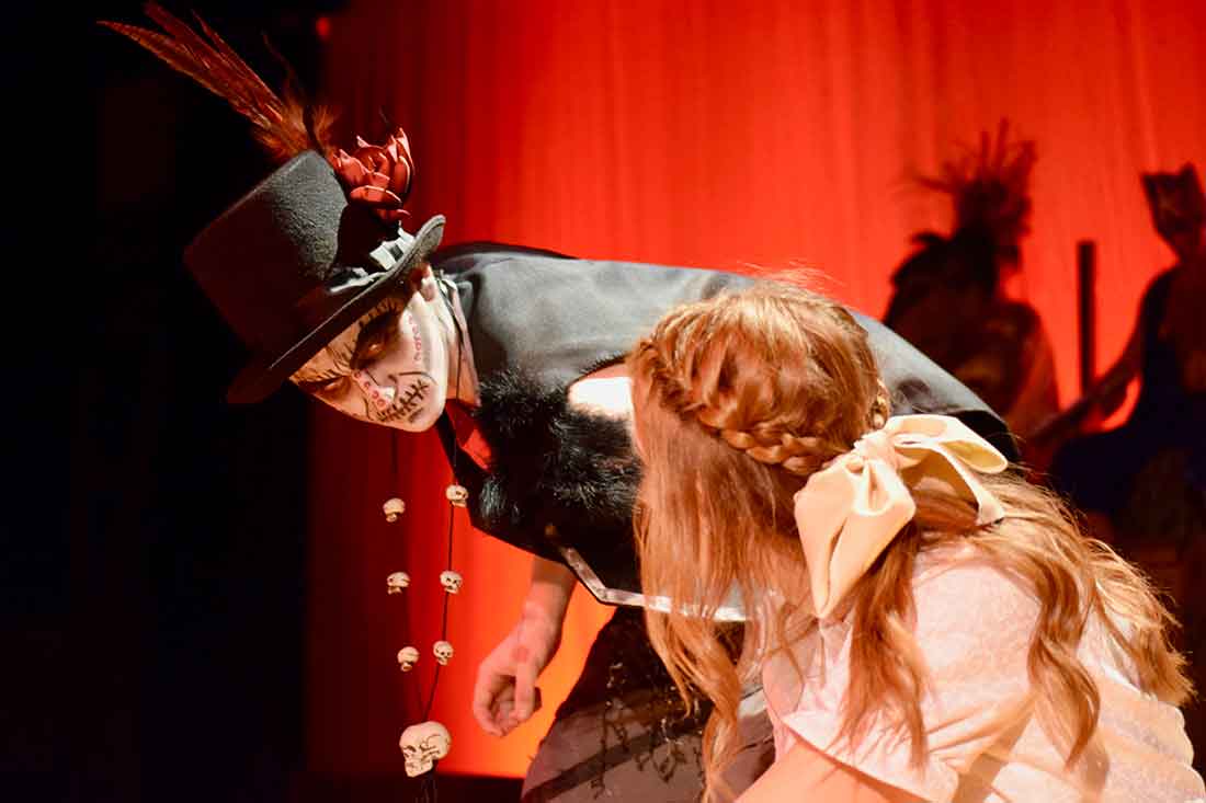 students on stage performing musical theater